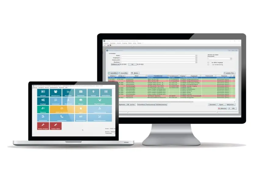 A laptop and a desktop monitor displaying different software interfaces; the laptop screen shows a colorful, tile-based menu, while the desktop screen shows a table with highlighted rows and database-like information.